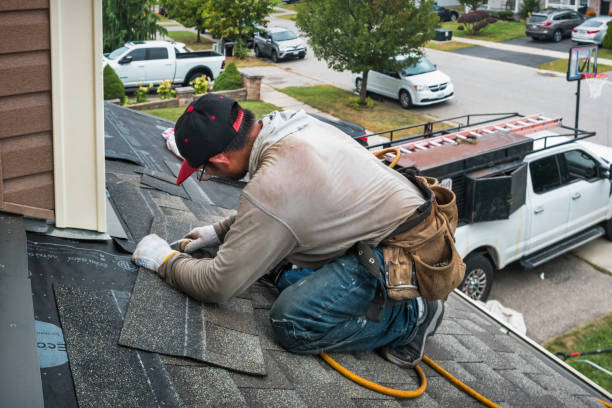 Professional Storm Damage Roof Repair technician working in Emerson, NJ